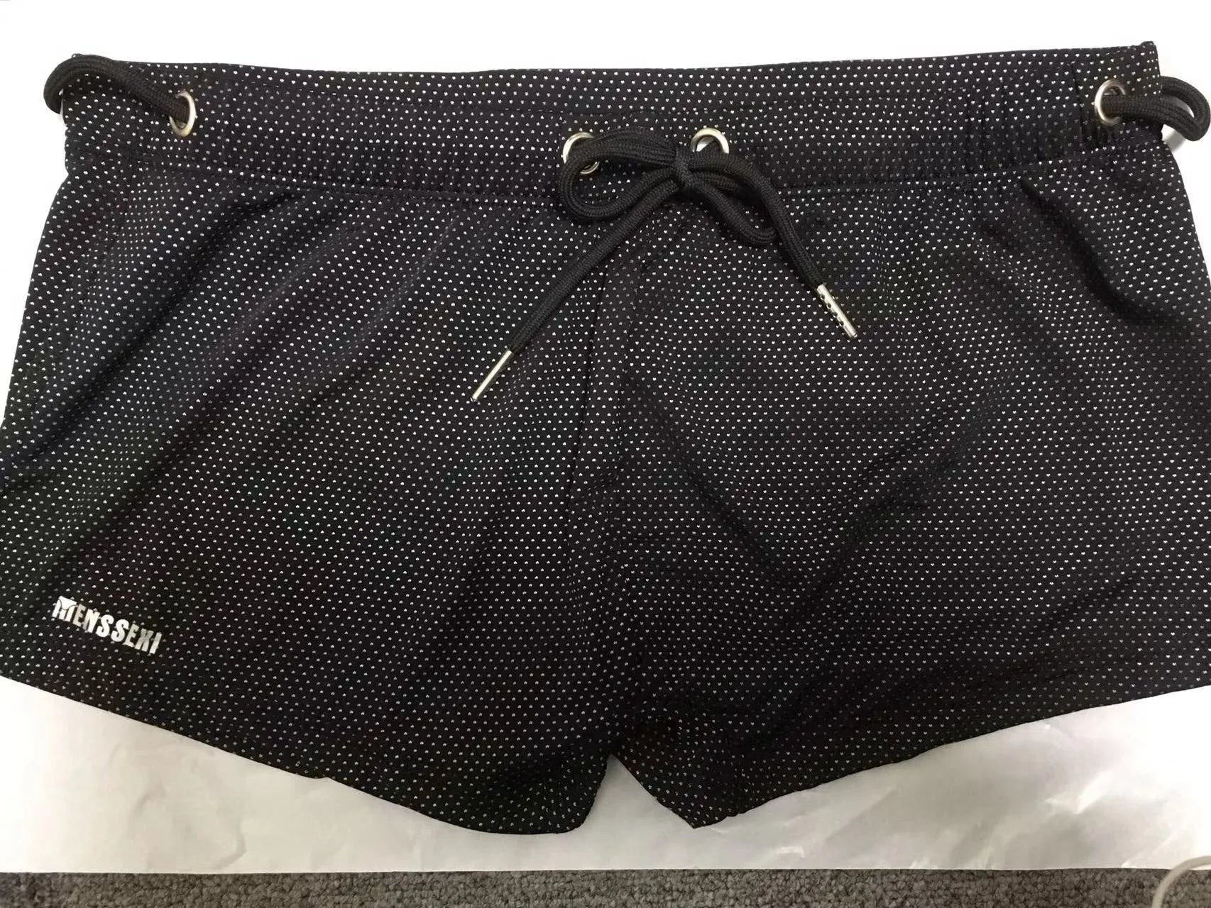 Men's solid colour nylon lace low waist swimming trunks in boxer briefs style.