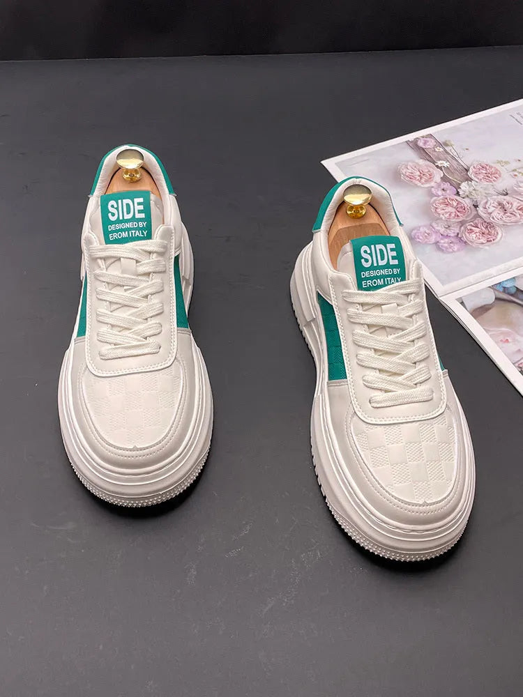 Unisex white and green cloth sports casual shoes with rubber foam soles.