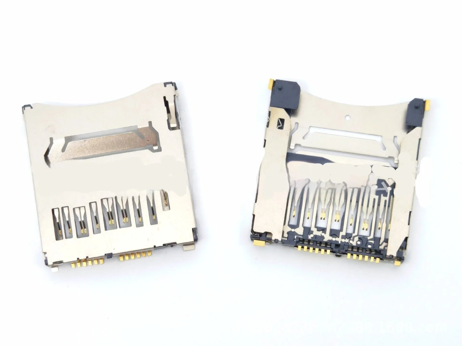 Alloy metal camera memory card slot showing high foot and low foot height options