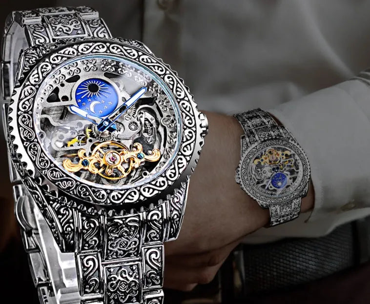 Men's automatic mechanical watch with hollow retro carved dial, moon phase display, stainless steel strap, 44mm gold finish