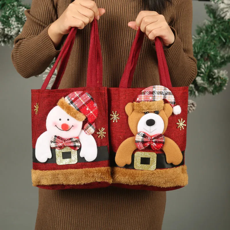 Small cloth Christmas candy tote bag with Santa Claus, snowman, deer and bear character designs