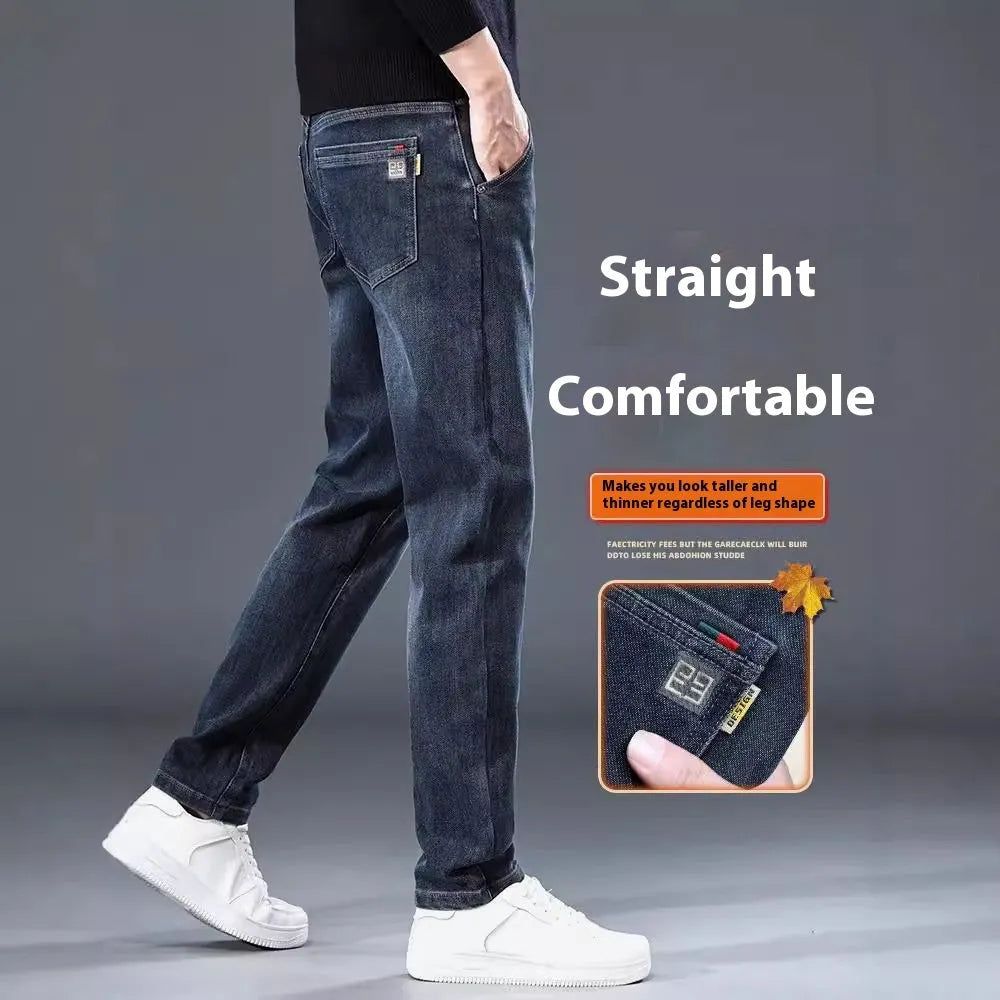 Man wearing blue-grey slim straight loose fit casual trousers with a micro-elastic waist.