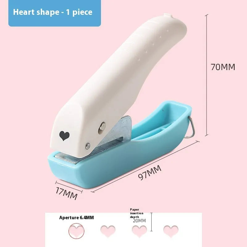 Manual handheld punching machine with love, star, and round pattern plates for paper craft.