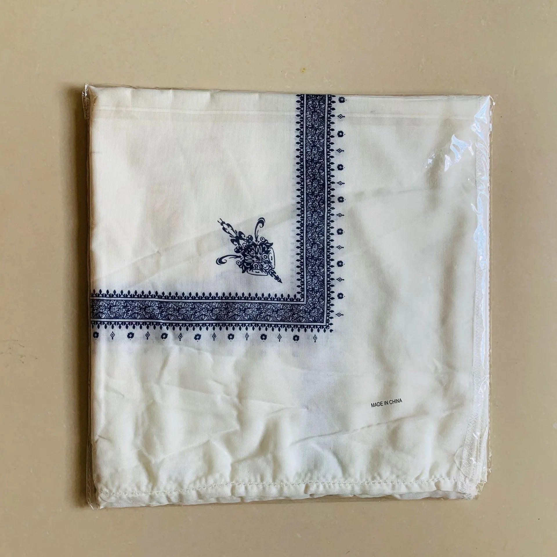 Printed square polyester scarf in six colour options measuring 138cm x 138cm