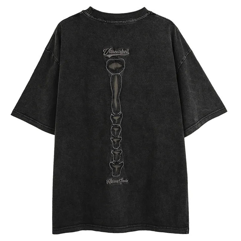 Man's loose black cotton t-shirt with skull and text print, featuring drop-shoulder sleeves.