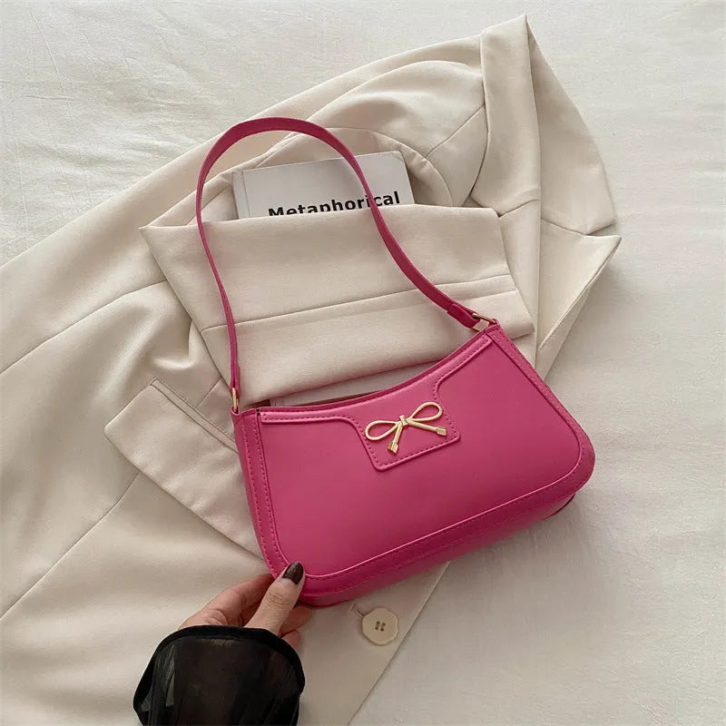 PU leather Western style baguette shoulder bag with bow detailing in six colour options