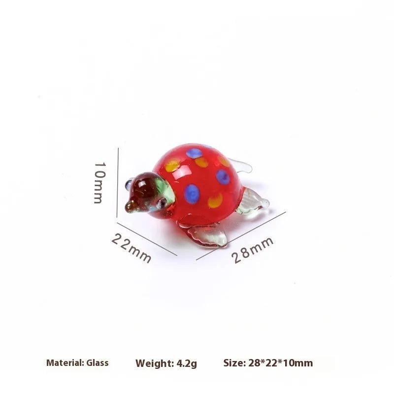 Geometric glass turtle ornament in modern simplicity style with hand-painted details