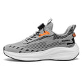 Men's white and green casual running shoes with fly-kit mesh, rotating buckle, and flat TPU sole.