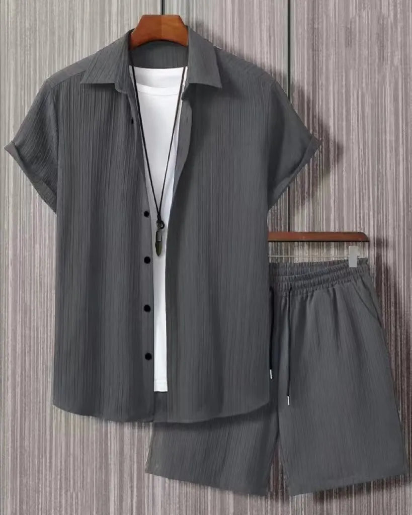 Short sleeve jacquard suit set with shorts in solid colour on a hanger