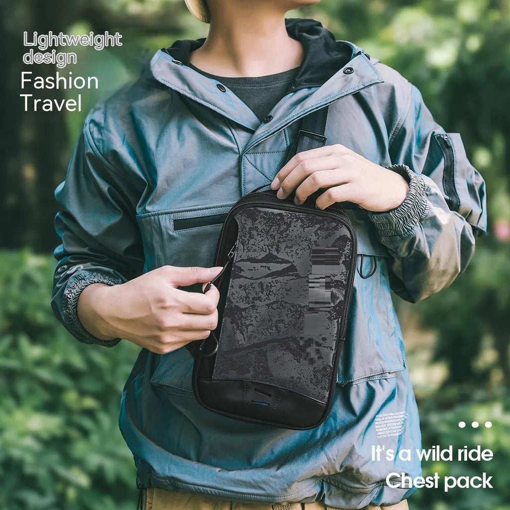 Casual black camouflage chest pack with a soft handle and single strap, showing internal phone pocket.