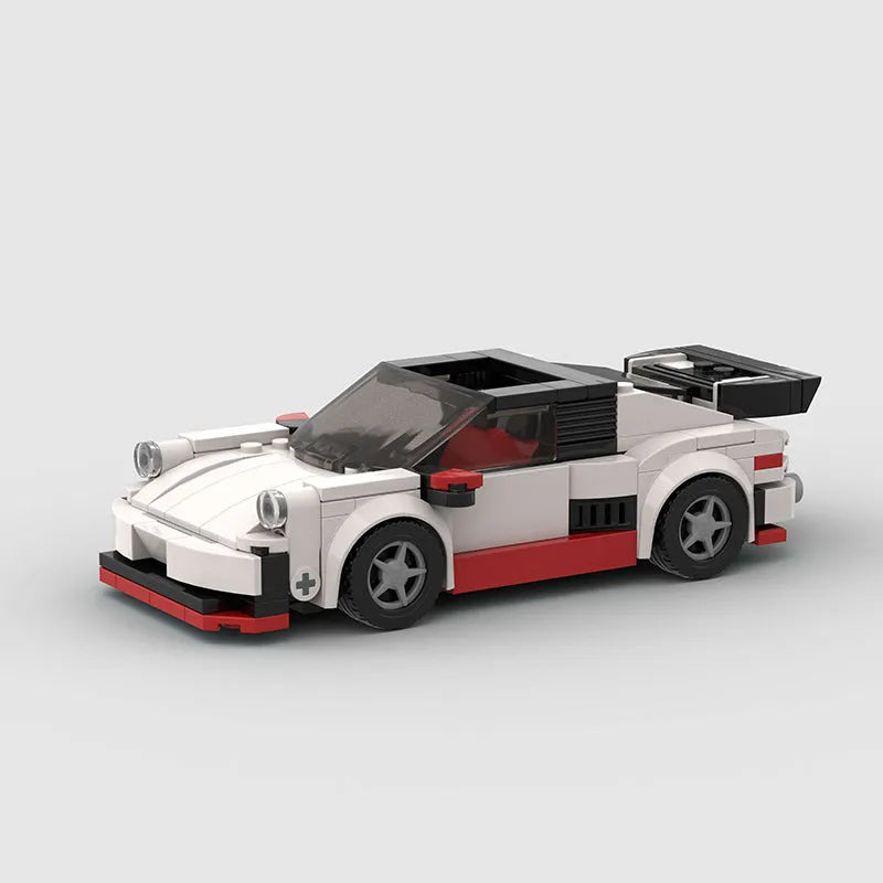 Small particle plastic building block set assembled into a sports car moc puzzle cool convertible car model showing the M10231 colour option