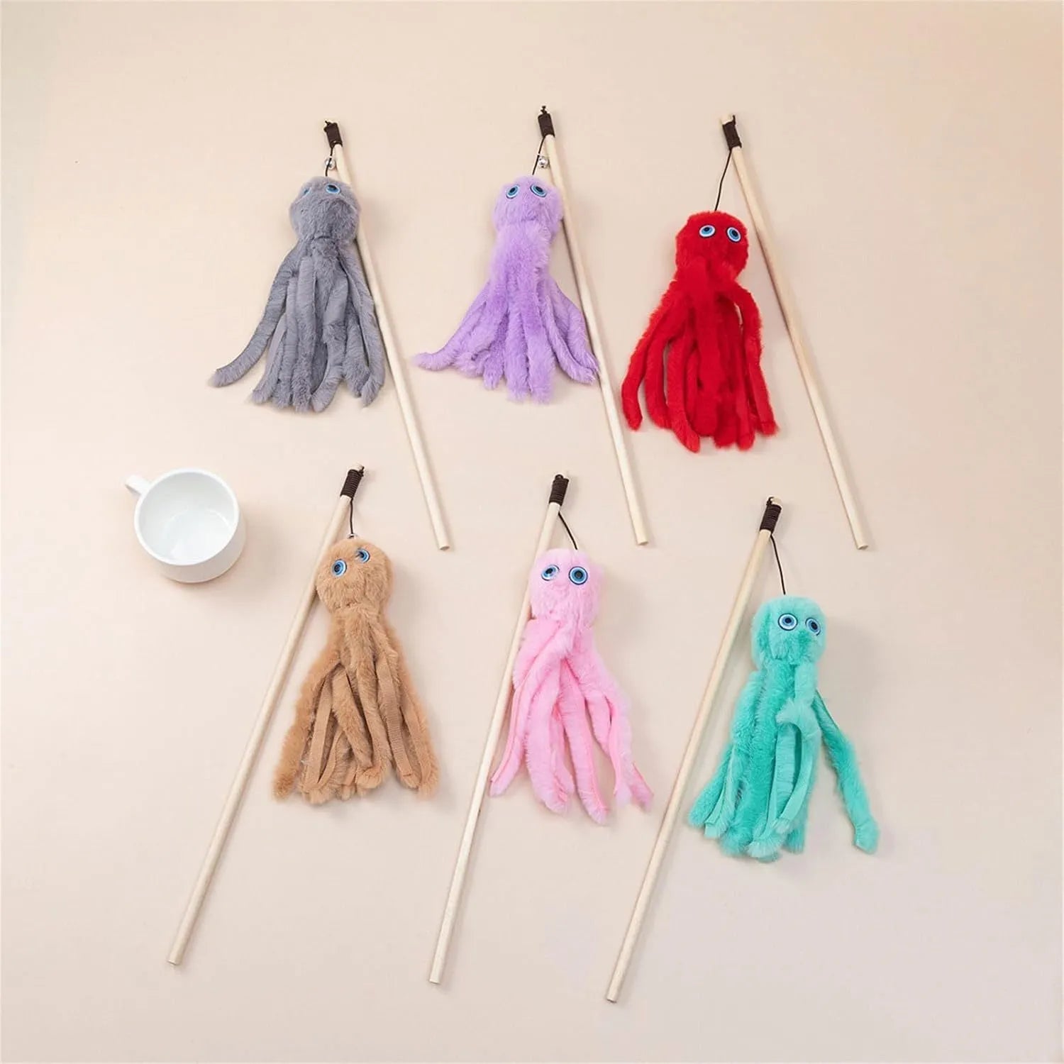 Octopus-themed cat toy with long stick handle in grey, pink, purple, or red colour options