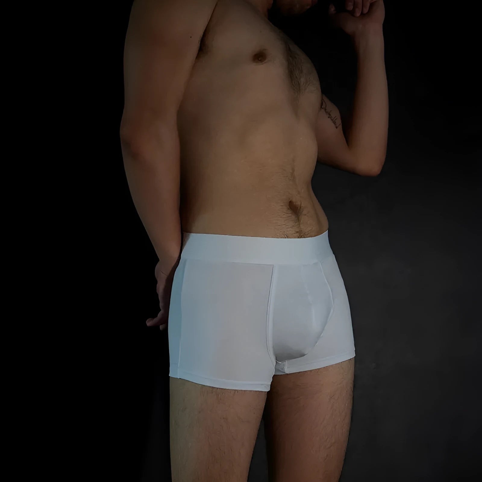 Men's solid colour cotton boxer shorts in black, shown in a loose fit style.