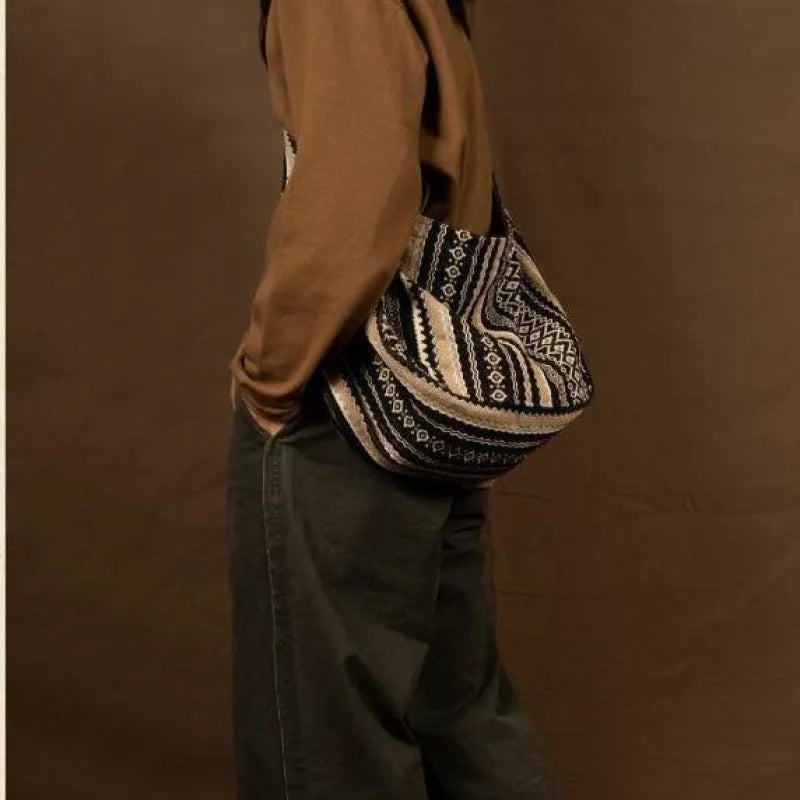 Retro striped corduroy messenger bag with adjustable shoulder strap showing jacquard pattern