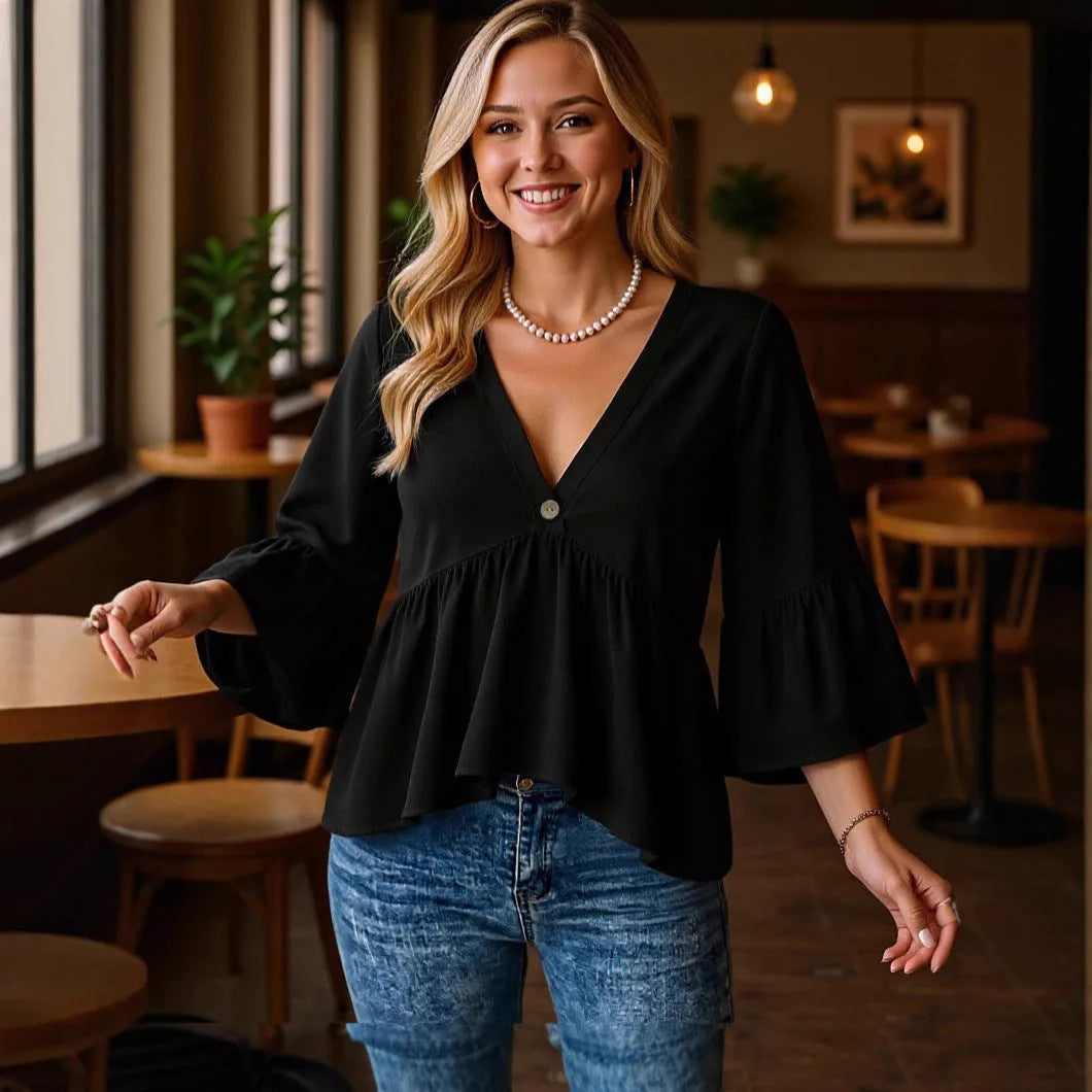 Women's solid black polyester shirt with seven-point flared three-quarter sleeves and pleated texture