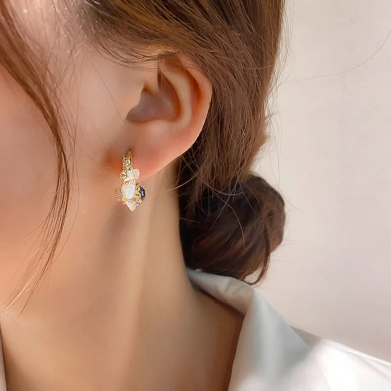 Green flower earrings with real gold plating, 925 silver needle, and diamond processing on an alloy body, gold colour