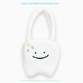 White plush large tooth design shoulder tote bag with crossbody strap and zipper opening