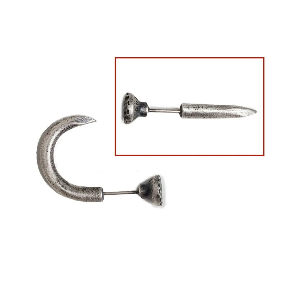 S925 sterling silver nail stud earrings in straight and curved punk designs on a plain background.
