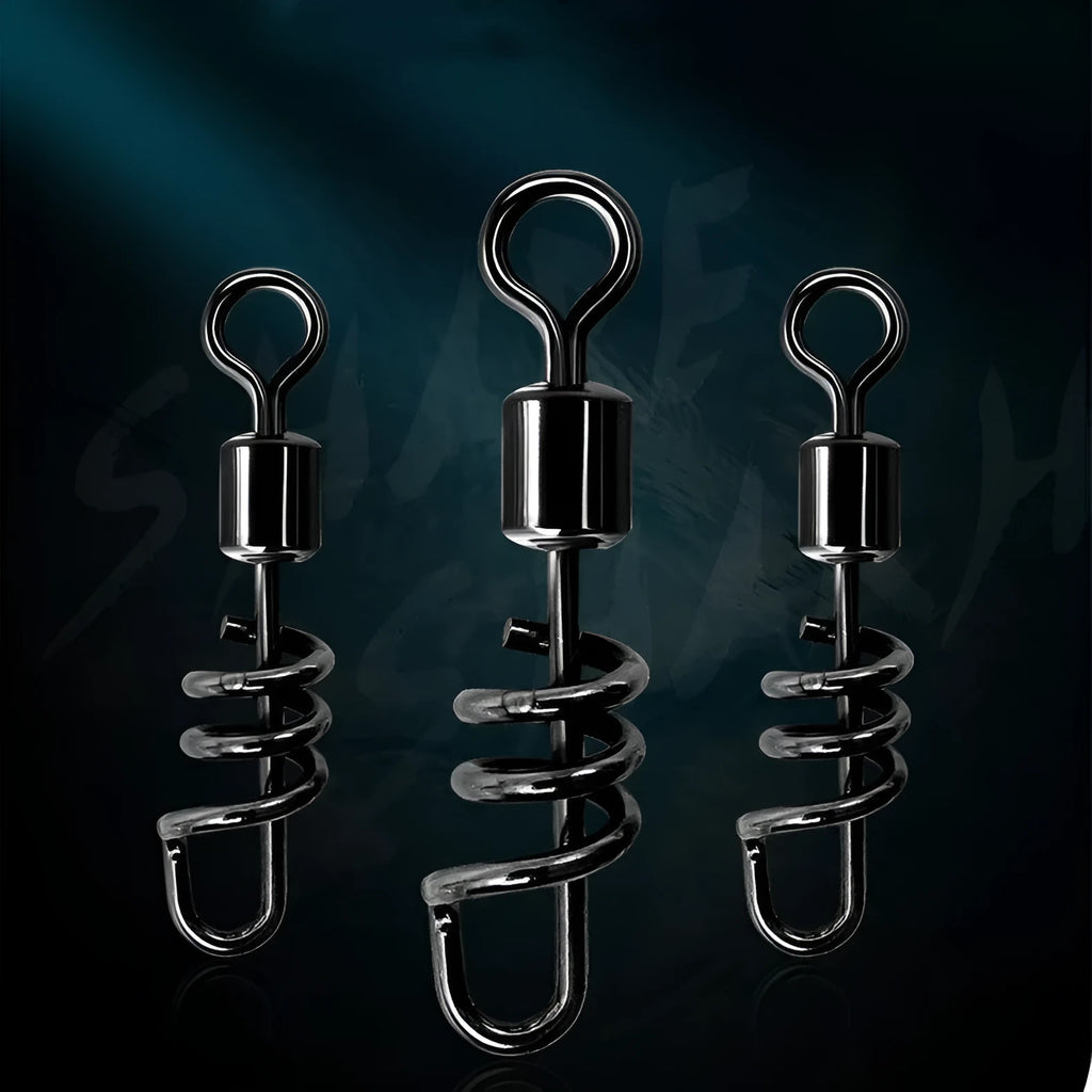 Close-up of a silver 8-shaped metal fishing swivel connector on a dark background.