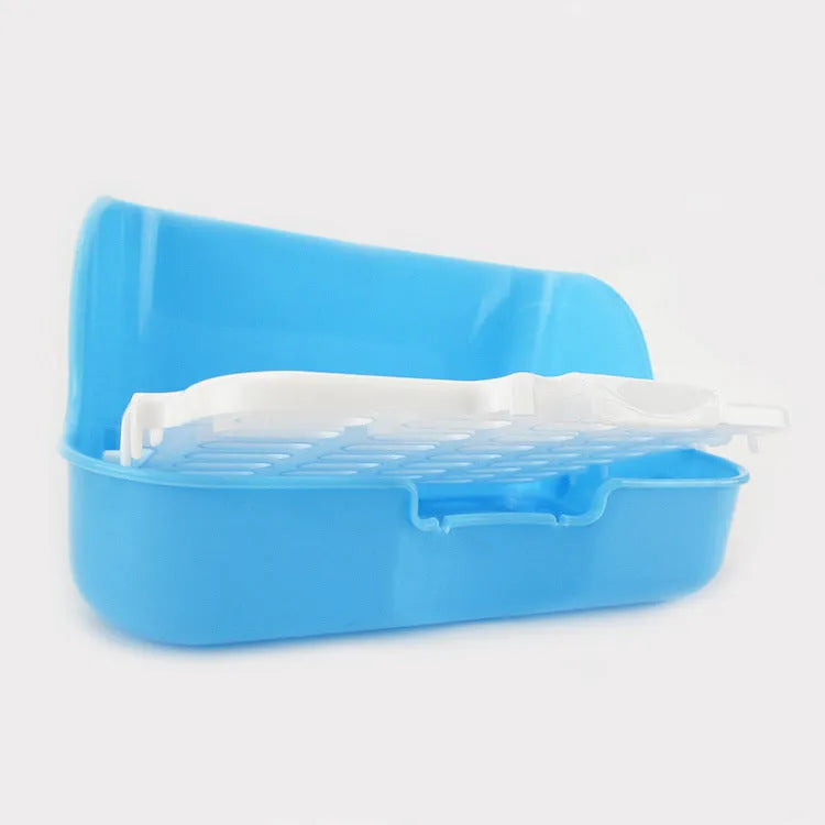 Large rectangular rabbit toilet in blue, measuring 30cm by 22cm by 16cm, with a shovel and garbage bag beside it on a surface