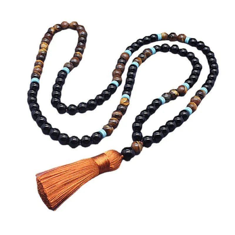 Black agate and tiger's eye geometric beaded bracelet and necklace set.