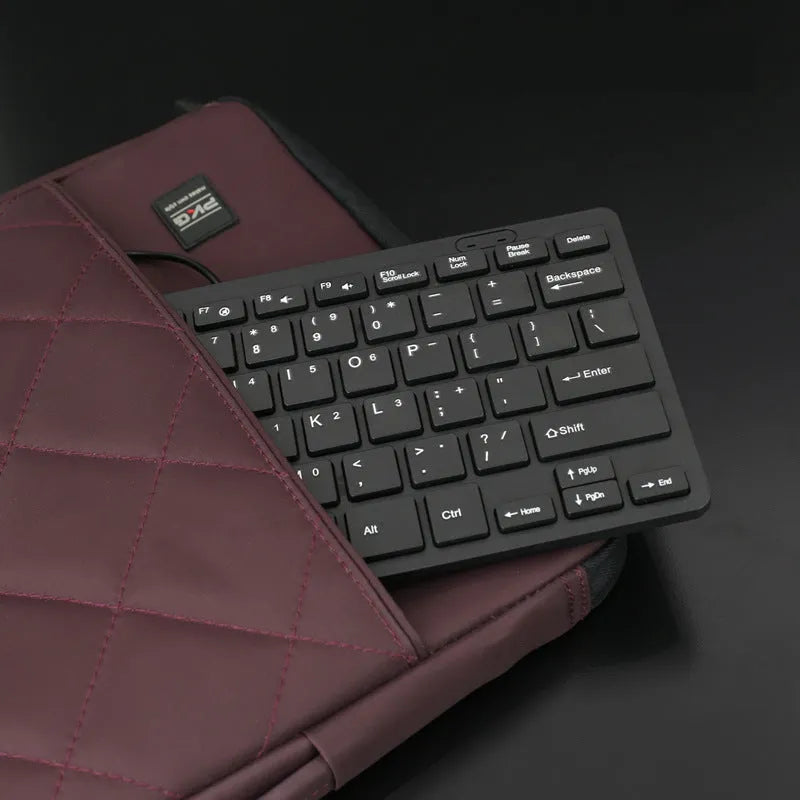 USB wired mini keyboard in black, white, pink, or blue colours with compact 280mm design