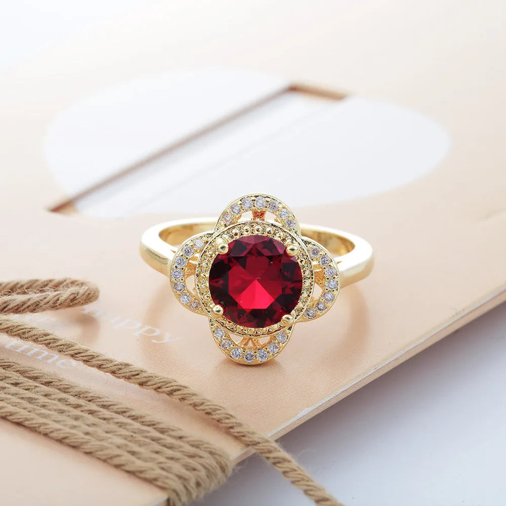Copper fruit-shaped ring with inlaid zircon stones in 1061395 colour.