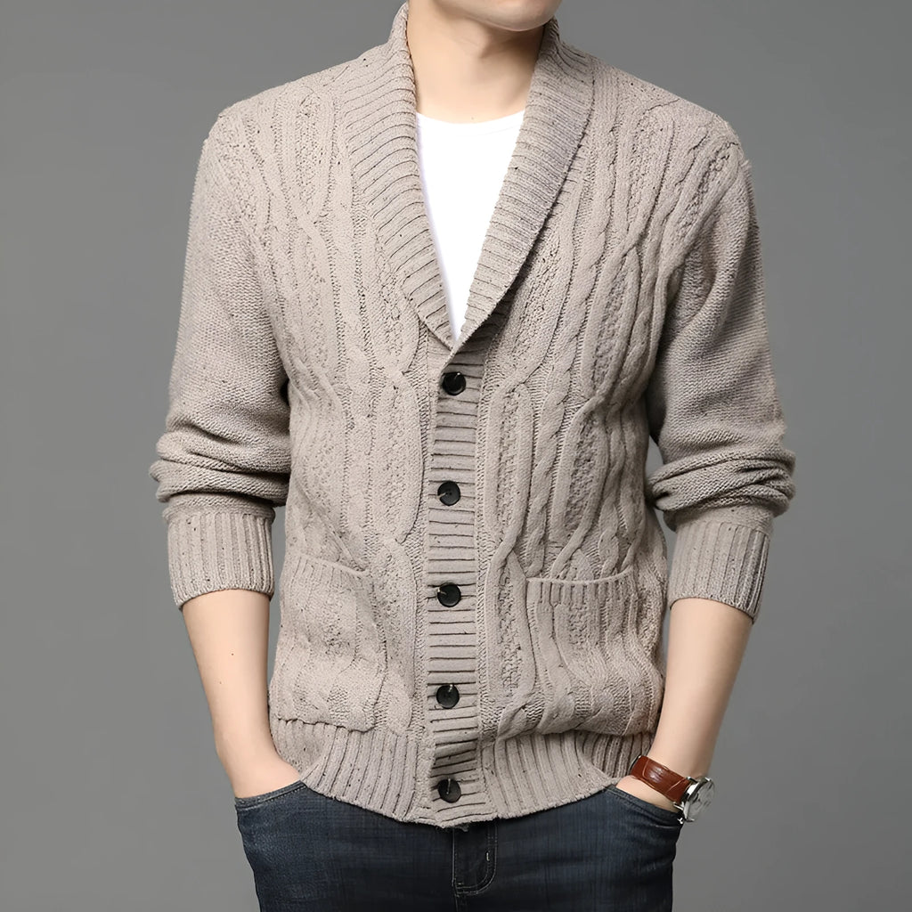Man wearing a black Korean-style jacquard patterned knitted cardigan jacket.