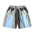 Blue patchwork outdoor sports shorts with loose straight-leg fit and above-the-knee length