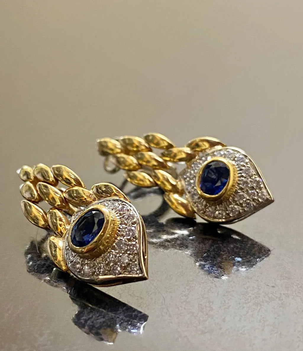 Pair of women's snake motif drop earrings in imitation gold with electroplated alloy finish