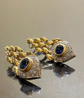 Pair of women's snake motif drop earrings in imitation gold with electroplated alloy finish