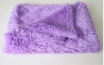 Long plush pet blanket for dogs and cats shown in light grey colour.