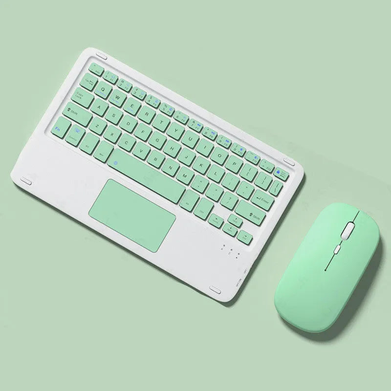 Pink Bluetooth touch keyboard and mute wireless mouse combo with USB charging cable on white background
