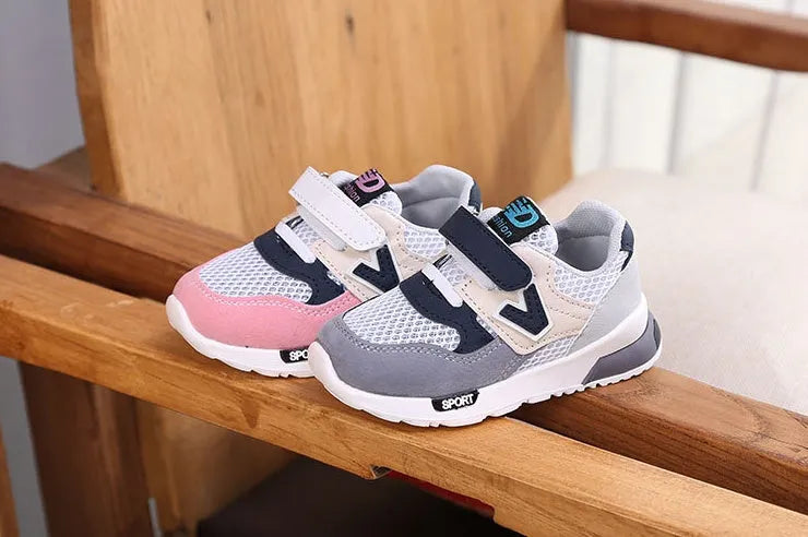 Girls summer mesh running shoes with TPR sole, grey colour, side view showing V-shaped design and breathable upper