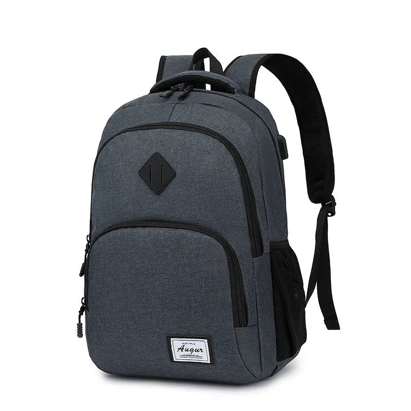 Grey lightweight nylon USB charging backpack with trolley sleeve, shown next to a phone and power bank.