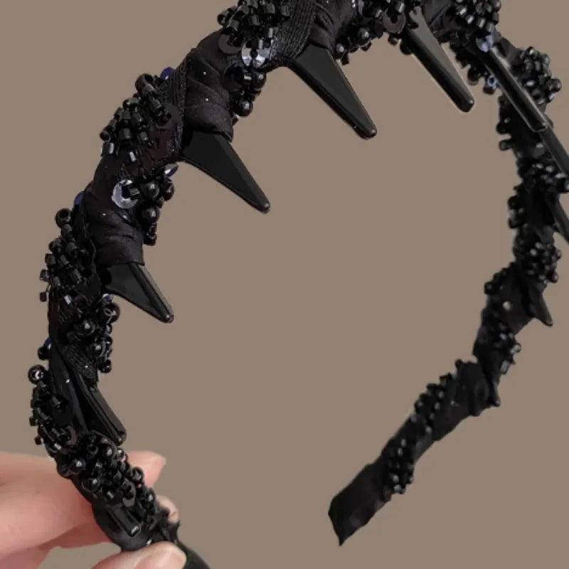 Women's velvet hair band with crystal wave decoration in red, black, and coffee colours.