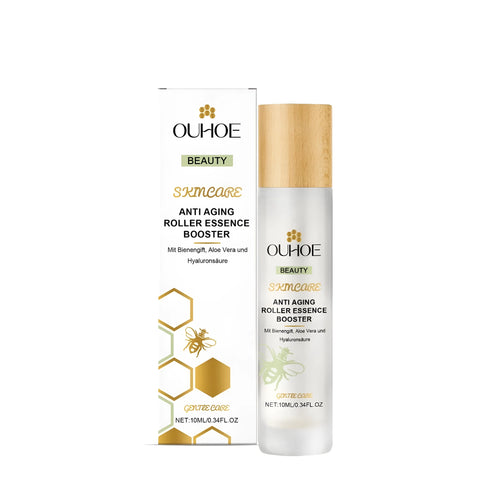 Smooth white ball roller for facial massage with 10ML anti-aging skincare formula.