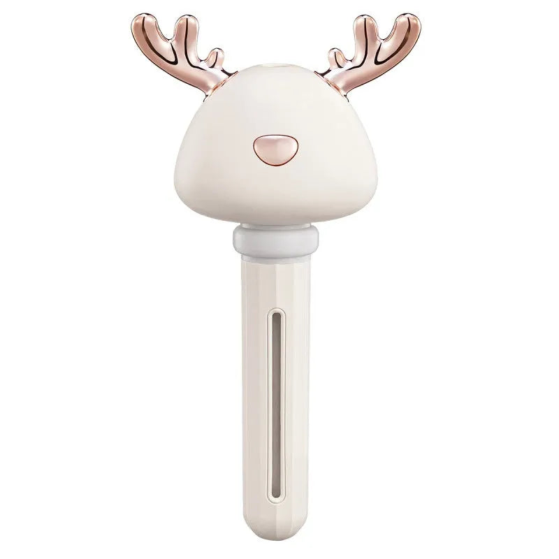 Donut mini humidifier USB car sprayer 54mm x 220mm in ABS and silicone, shown in Beige Elk, Pink Elk, or White