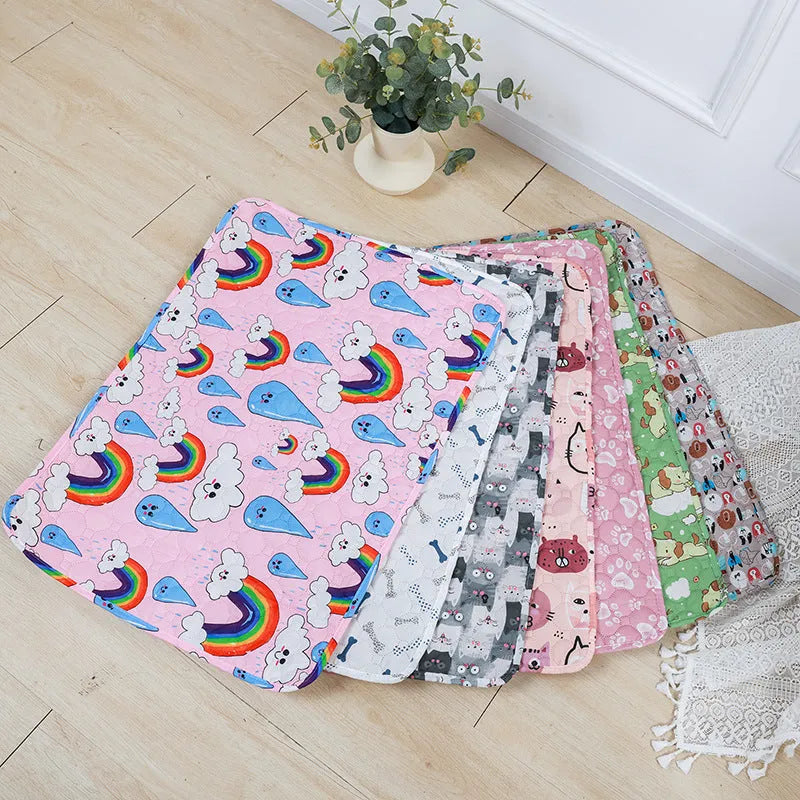 Washable waterproof pet training pad showing printed design options and size comparison