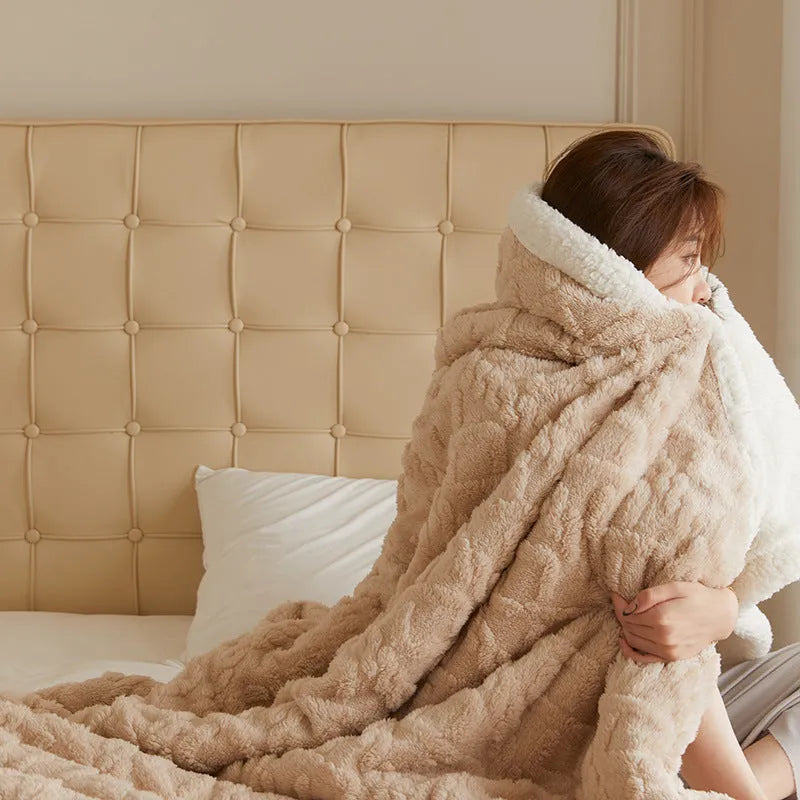 Polyester winter thermal flannel blanket in beige, laid flat showing its texture and simple modern style.