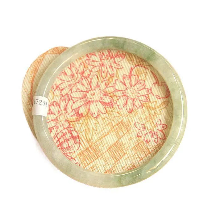 Green jade geometric bracelet with waxy finish showing 10mm width and Chinese style design