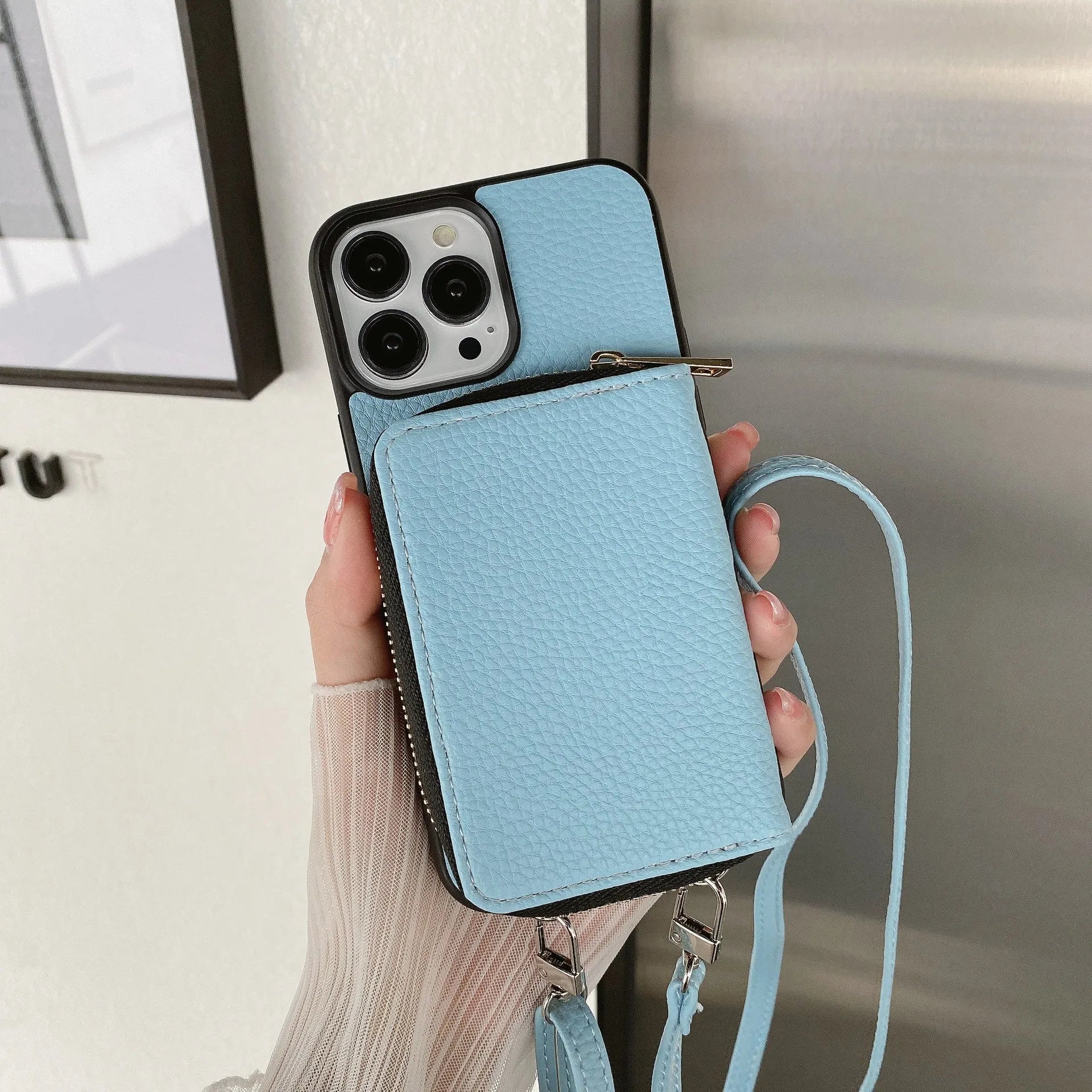 Litchi pattern phone case for iPhone in PC and leather, shown in blue colour.