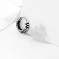 Geometric retro twist stainless steel earrings with circular sports style element in silver