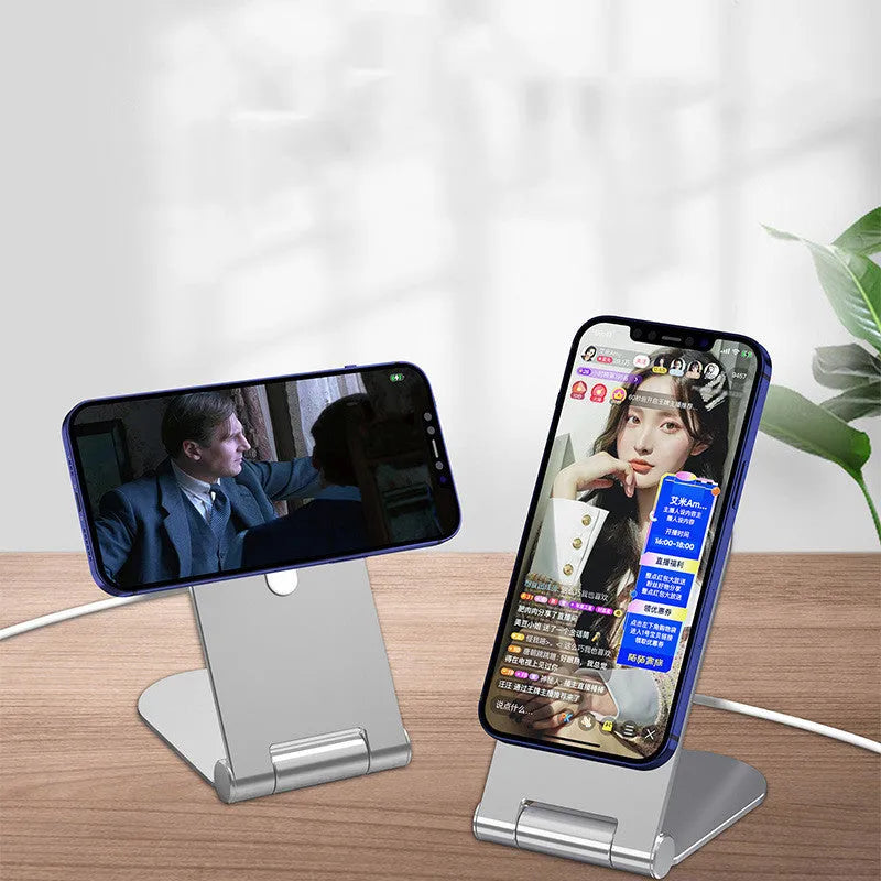 Silver adjustable magnetic phone bracket for iPhone 12 shown in a compact, portable design.