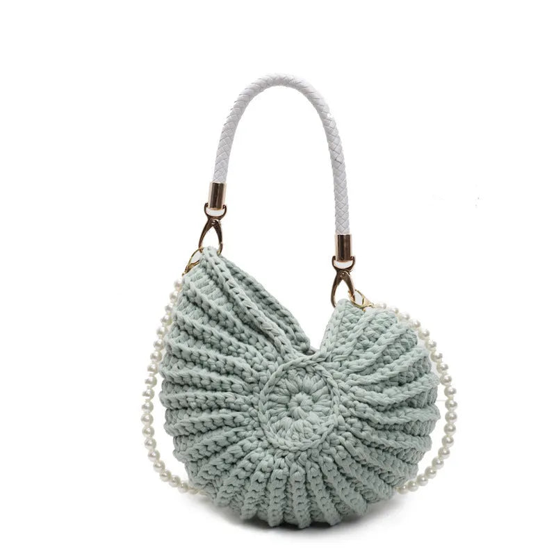 Handmade woven cloth bag in retro style with open pocket and double shoulder straps.