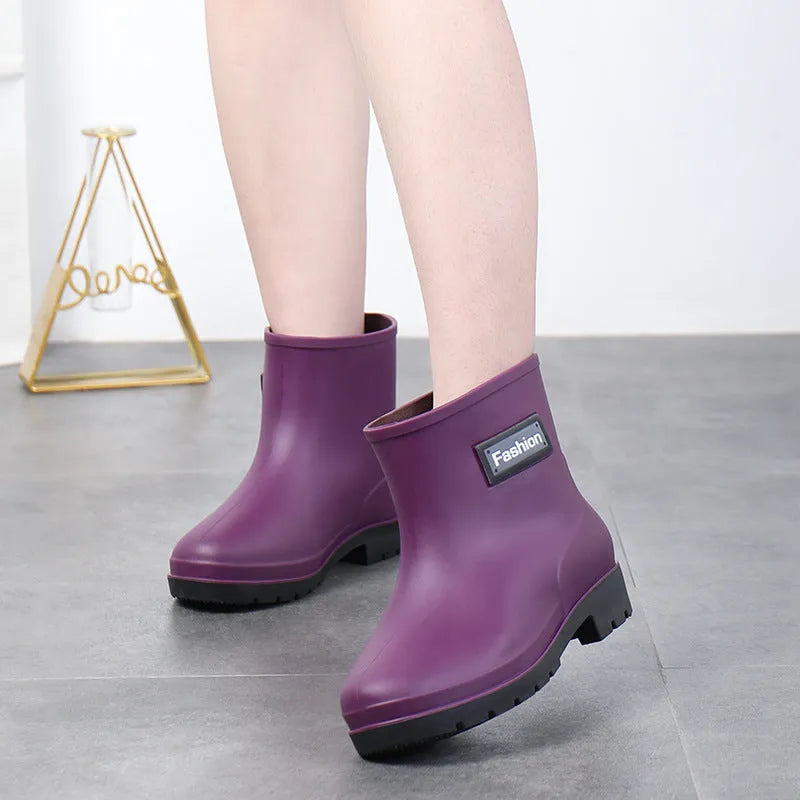 Women's mid-calf rain boots in PVC material with low heel for waterproof work wear