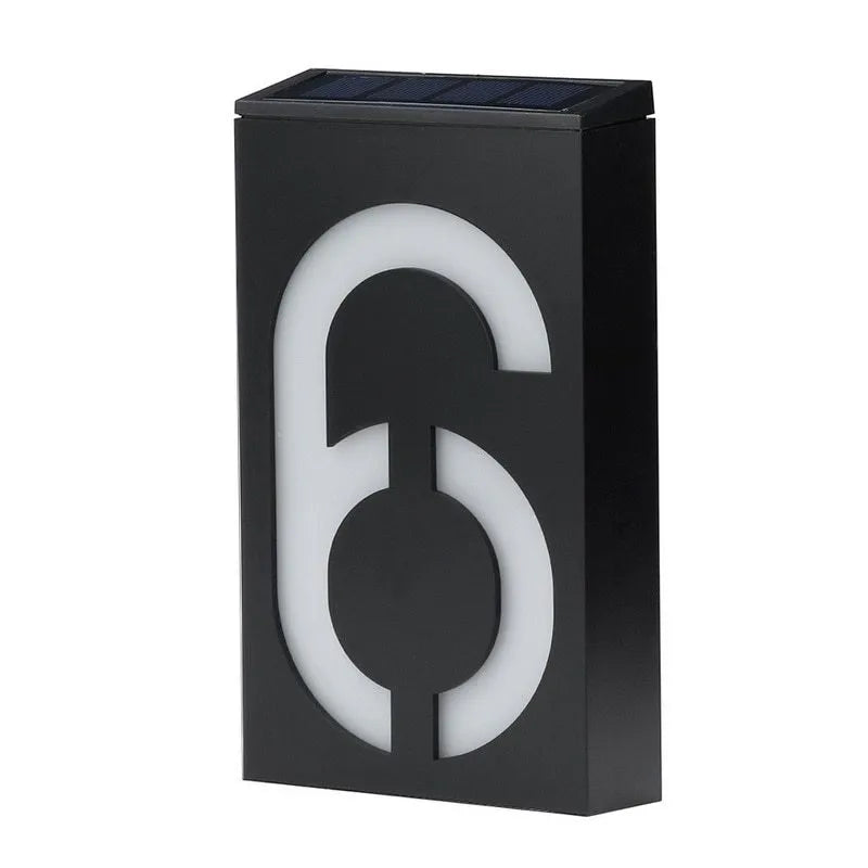 Solar powered house number light with white LED illumination and wall mounting bracket