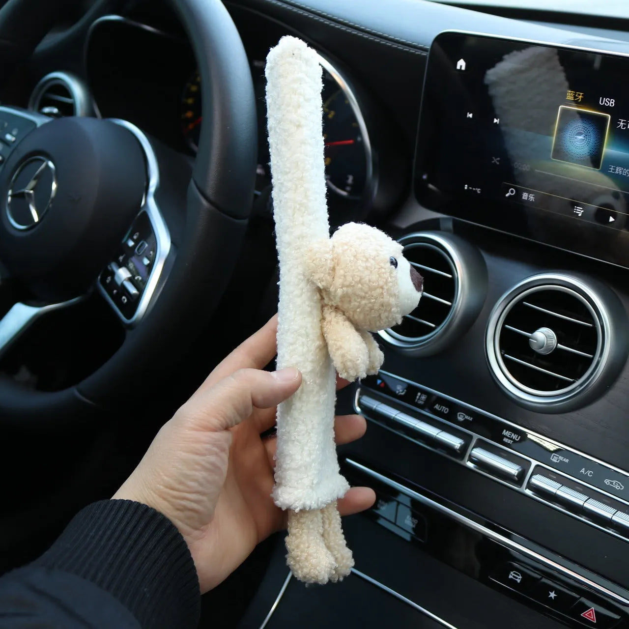 Cartoon plush seat belt shoulder protector in lamb wool with bear and rabbit designs.