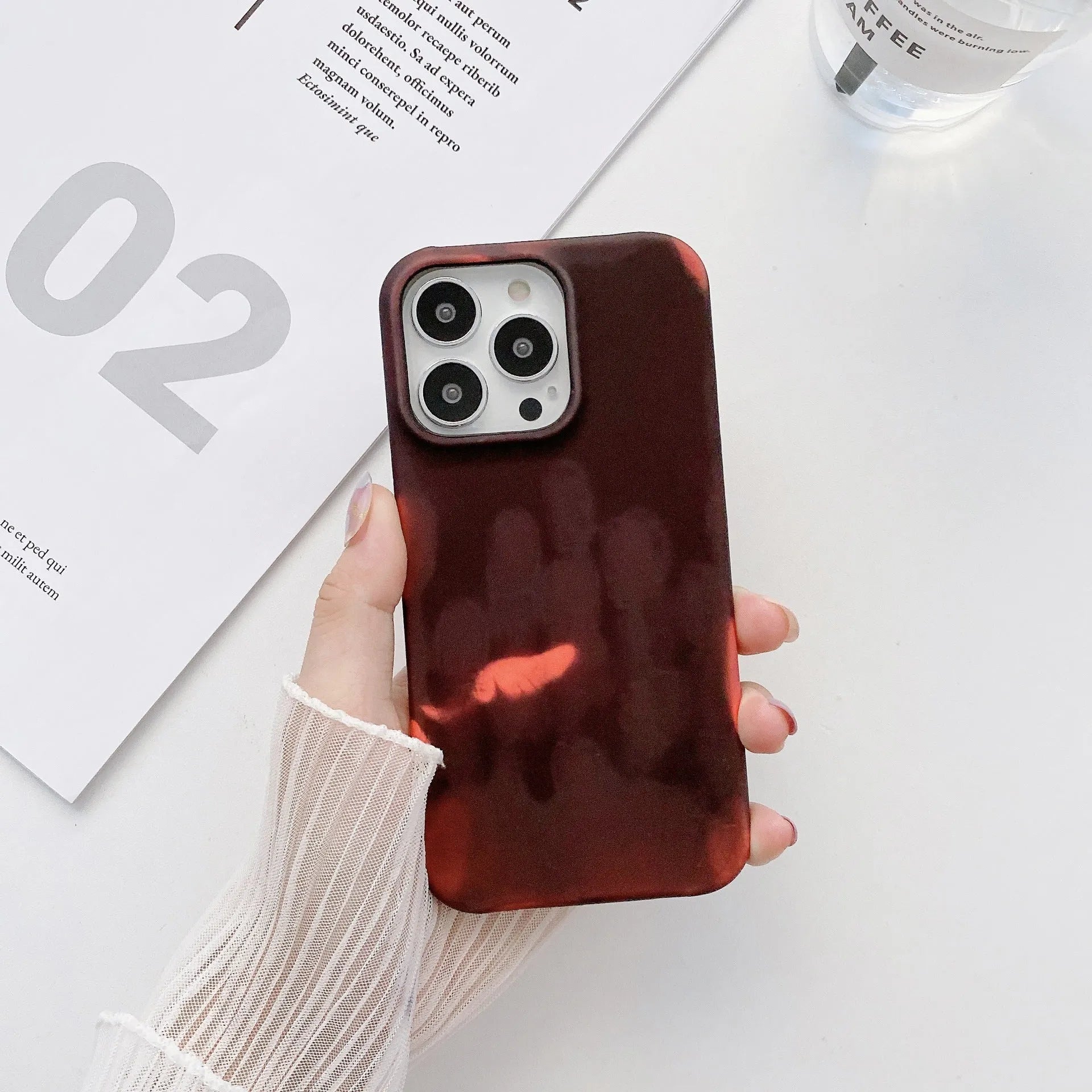 Heat-sensitive inner velvet half-wrap color-changing phone case for iPhone 13 showing black to green shift with PC material anti-drop protection