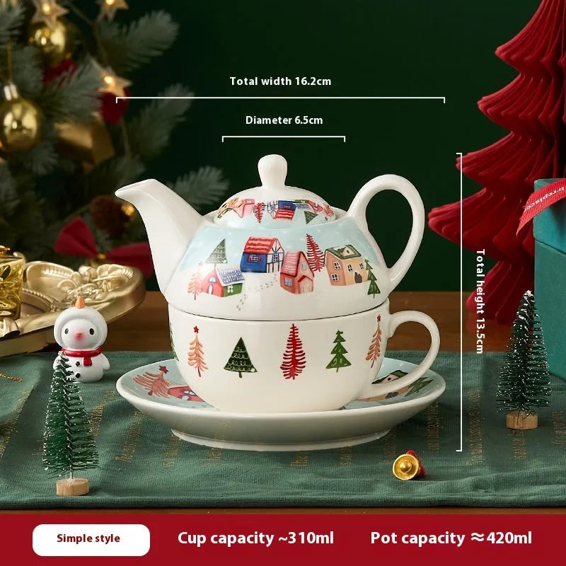 Ceramic tea set with gold-plated teapot and matching cup on dish, snowflake pattern, gift box